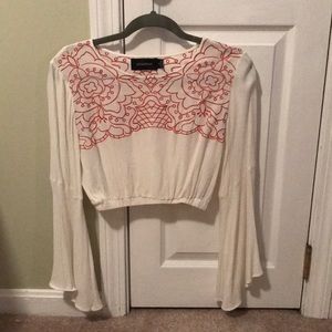 White bell sleeved crop top